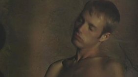 Dark-haired twink is getting face-fucked in the dark