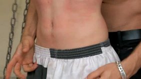 Chained-up prisoner dominated by a hung hunk, gay XXX