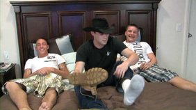 Two horny twinks are about to fuck a cowboy-looking hunk