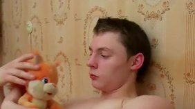 Horny young amateur plays with stuffed toys and jerks off