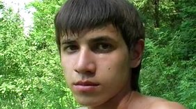 Shredded young twink jerking off while eye-fucking the camera